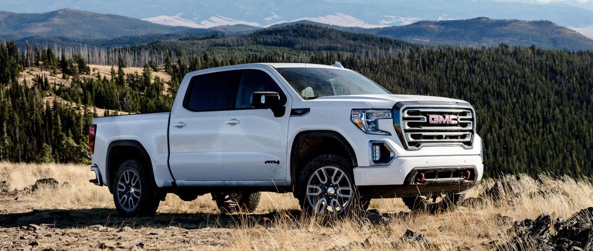 GMC pickup parked in mountain side